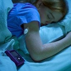How do you sleep with an insulin pump attached?